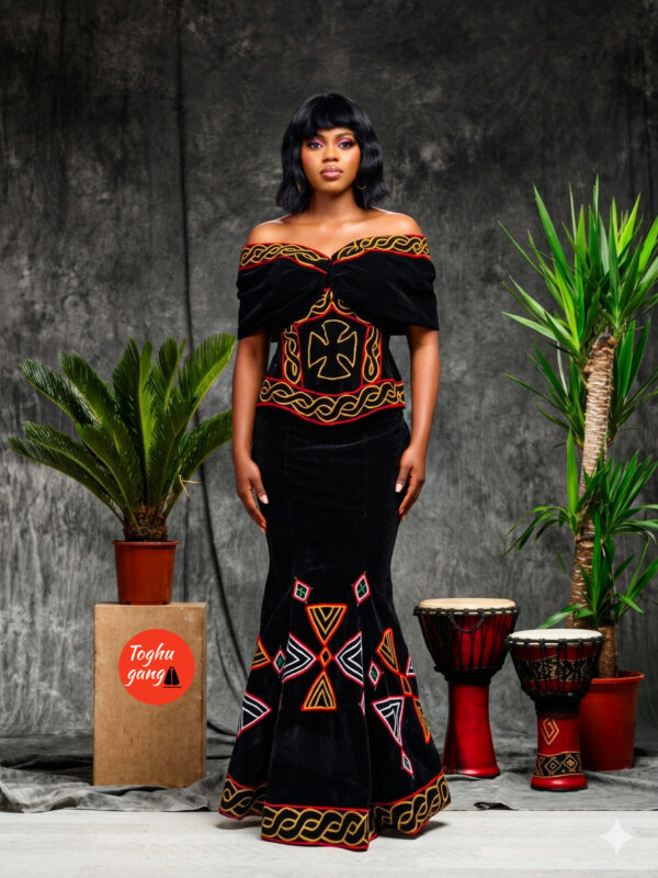 Premium black velvet off-the-shoulder mermaid gown with traditional Cameroonian Toghu embroidery.